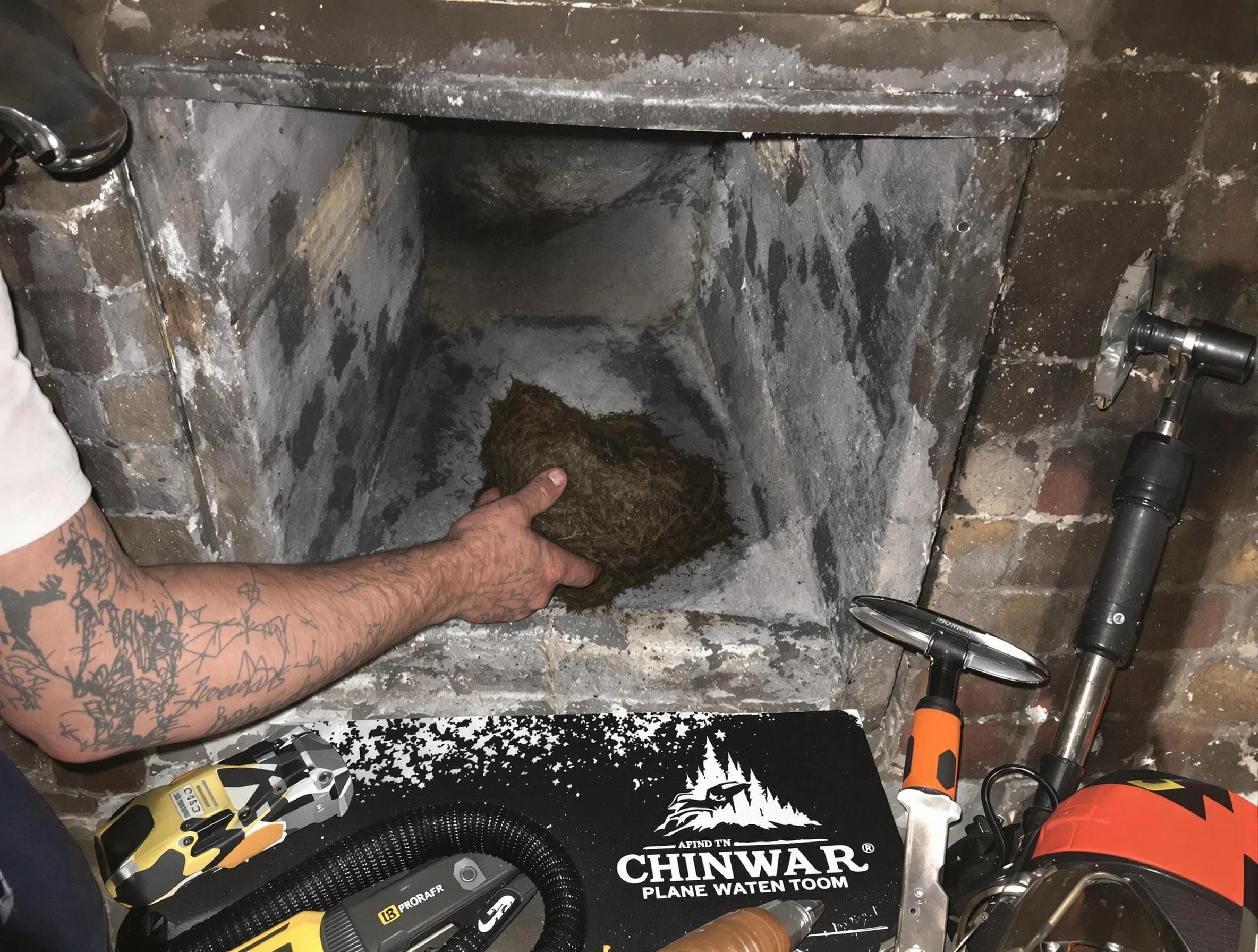 Nutley Chimney Sweep safely removing debris and screening chimney in Nutley, NJ
