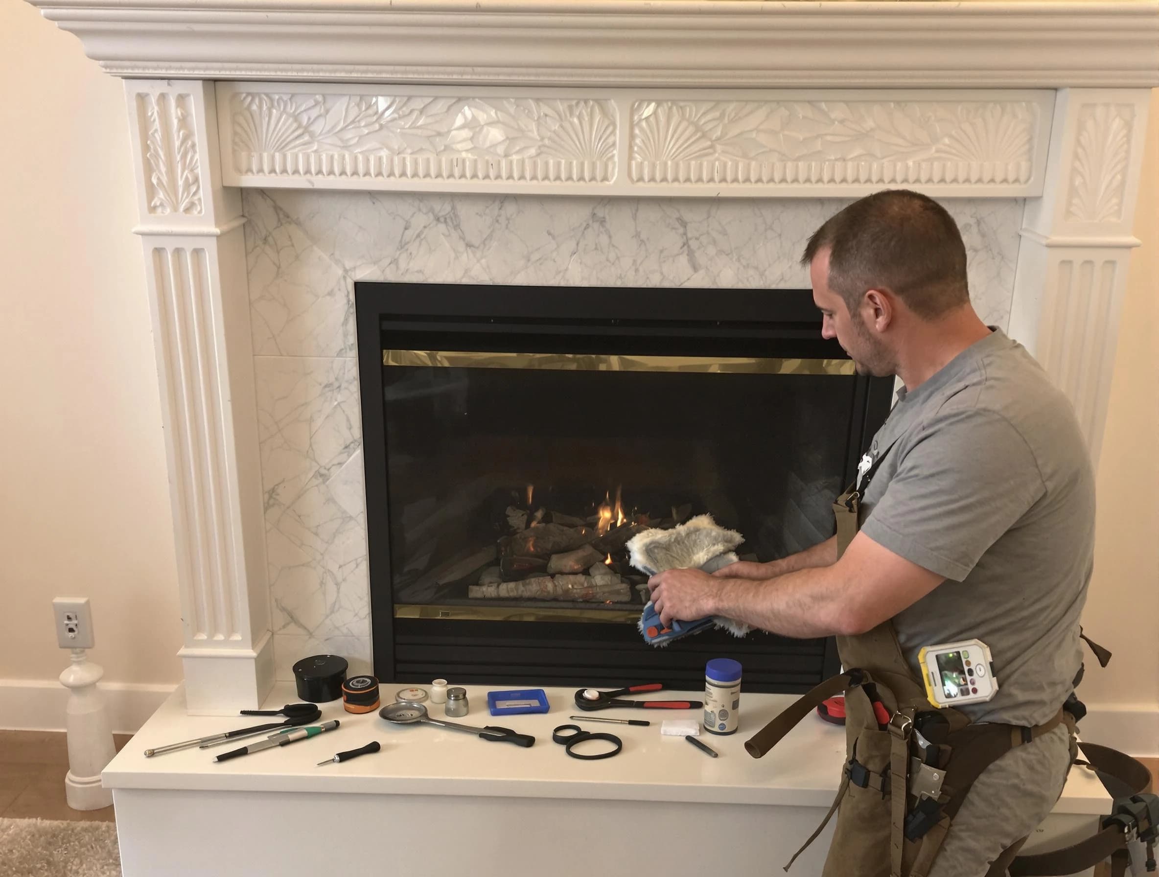 Nutley Chimney Sweep performing fireplace maintenance in Nutley, NJ